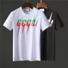 2022 Mens Designers T Shirt Man Womens Tshirts مع رسائل طباعة الأكمام القصيرة القمصان الصيفية الرجال فضفاضة المحملات الآسيوية S-XXL