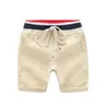 2-8 år barn shorts bomull sommarshorts för pojkar flickor godis färg shorts småbarn trosor barn strand korta sportbyxor baby