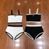 2022 women's Women's Tracksuits summer color blocking letter backless one line collar knitted suspender simple sexy sleeveless short suit