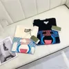 Diseñadores Camiseta para hombre Calidad original Camisetas de lujo Ropa para mujer Verano Cuello redondo Mangas cortas Al aire libre Transpirable Algodón Impreso Amantes Ropa Tallas grandes