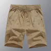 Heren shorts heren vijfpunts broek zomer katoenstrand los grote maten l-5xl-110 kg man buitenkleding korte mode kledinglieden