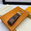 2023 Dragonne Anahtar Tutucu Aksesuarlar Tasarımcı Floral Canvas Keychain Araba Ticari Zincir Yüzük Takımı Pochette Accessoires Kimlik Ad Tag 284m