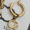 Kobiety retro kolczyki projektant biżuterii litery damskie okrągłe kolczyki