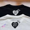2022SS Human Made T-shirts Homens Mulheres Impressão de desenhos animados Mangas de algodão curto solto de algodão curto haikyuu