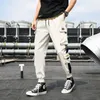 Pantalons pour hommes Poches latérales Cargo Harem Rubans Noir Hip Hop Casual Mâle Joggers Pantalon Mode Streetwear 220827