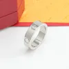 Banda de acero inoxidable 316L Anillo de amor de lujo de oro de 18 quilates Anillos de pareja unisex de moda Joyería de diseñador para mujeres 7299617