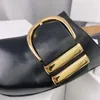 Khaite Downing Goldtone Buckled Leather Mules tofflor Luxe Slipon Beach Shoes Rounded Closed Toes Casual Flats för kvinnor L1900587