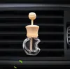 Bouteilles de parfum de voiture vides avec clip Bâton en bois Diffuseurs d'huiles essentielles Clips de ventilation de climatiseur Désodorisant automobile Bouteille en verre Décorations de voitures GC1129