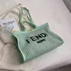 2022 Fabriksrabatter Stor kapacitet Straw Bag Kvinnors Vår och Summer Beach Vacation Shoulder Fashion Commuter Tote Bag