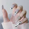 Falska naglar 24pcs vit stjärna leopard ballerina bärbar konstgjord kista fake full cover press nagel tips manikyr verktyg