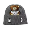 2022 Winterkappen Hüte Frauen Motorhaube verdicken Mützen mit echtem Waschbärfell Pompons warmes Mädchen Cap Snapback Pompon Mütze Hat8849567