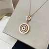 Joya de diseñador de mujer Collar de oro personalizado Círculos concéntricos Cachuelas Pendientes de cadena Versión Alta Circleos largos de Circularidad Simple