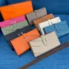 Дизайнерские длинные кошельки ESPOM Целые подлинные кожаные держатели карт с серебряными аппаратными сумками кошельки модные ковры кошелька для леди