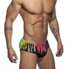 Costumi da bagno da uomo Slip da bagno da uomo Cuciture alla moda Colore Vita bassa Sexy Coulisse Tavola da surf Pad Push-up Nuoto Allenamento da immersioneUomo