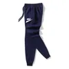 Bawełniana odzież uliczna mężczyźni/kobiety biegaczy marki męskie spodnie dorywczo spodnie niebieskie spodnie dresowe Jogger Fashion Fitness Workout spodnie dresowe S-3XL