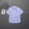 Kläder sätter thailändsk skoluniform Purple Women's Men's Turn-down Collar Shirt JK Kort ärmskjorta