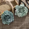 Flores decorativas grinaldas 100pcs por atacado Artificial Wall Wreath Wedding Christmas Decortion Candy Box Diy Broche Headwear