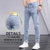 Pantalones vaqueros de verano para hombre, versátiles, informales, de tendencia, elásticos, azul claro, ajustados, para pie pequeño, para hombre