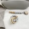 Kleidungssets Baby Badespielzeug Set Holz Rassel Armband Silikon Kauring Appease Kit für geborene Säuglinge Mädchen Jungen Dusche GeschenkKleidung