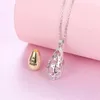 Urne de crémation collier pendentif en acier inoxydable pour femmes hommes médaillons creux bijoux commémoratifs souvenir pour animaux de compagnie ou cendres humaines