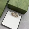Rhinestone Flower Letter Charm Earrings Ladies Diamond Floral Earndrops Personlighet Temperament Crystal Danglers grossist