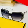 نظارة شمسية مصممة للمرأة جديدة للأزياء اتجاهات العلامة التجارية العلامة التجارية غير الرسمية UV400 الكلاسيكية قطعة واحدة نظارات واقية FF0473 سيدات شمسية مع حالة