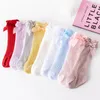 Mignon nœud papillon bébé chaussettes été maille filles chaussettes doux respirant princesse nouveau-né genou chaussettes hautes enfant évider chaussette