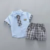 Set di abbigliamento boy#39; st-shirt a manica corta a piombo a quadri e pantaloncini per due pezzi per la festa della festa di compleanno