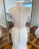 Romantyczne koronkowe sukienki ślubne 2022 Oszałamiające sukienki ślubne Syrenka klejnot dekoltu sądowy Zamek ogrodowy