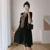 Letnia szyfonowa sukienka macierzyńska z łukiem Office krótki rękaw