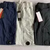 Spodnie Cargo Pants Men Street Designer Masowa marka kieszonkowa soczewki frotte tkanina dresowe mężczyźni i kobiety parą prawdziwe zdjęcie