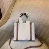 Bolsas de mão de grife bolsas de lona para mulheres bolsa de grande capacidade bolsas de ombro fashion bolsa feminina bolsa mensageiro corpo cruzado fita decoração carta bolsa de compras de luxo