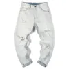 Heren jeans hiphop mannen gewassen witte los fit vintage holte gaten van verontruste mannelijke denim broek Motocycle gescheurd