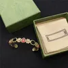 Pulseiras de flor de rubi elegante letra de letra dupla aberta pulseira de letra de intertravamento floral com caixa