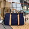 Duffel Bags Мужская портативная сумочка для путешествий с большой способностью мужской бизнес багаж женский хранение туристическая спортивная сумочка 220626