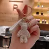 Söta handgjorda smycken DIY -tecknad strassar björnar nyckelring kristallbomgom björn nyckelkedjan nyckelväska charm hänge tillbehör 15 färger