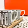 Fin porslinmugg för kaffekopphandtag Utsökta förpackning Lyxdesigner Mugs Gift265M7995131