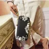 Carteiras Bolsas de pulso de luxo Mulheres embreagem de cristal bolsas de couro genuínas Flores de moda Flores longas 2022 Ladieswallets