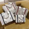 2021 axelväska brev tryck rand kvällspåsar stor kapacitet tote woody canvas kvinnlig casual handväska shopping väskor