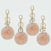 Fluffy Pink Pompom Faux Rabbit Fur Ball Keychain Crystal Letters Golden Key Rings Key Titular Trendy Jewelry Bag Acessórios Presente