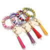 Bracelet en bois de perles, bijoux à pompon en Grain de léopard, Bracelets de perles colorés à la main, Bracelet à franges arc-en-ciel, porte-clés de poignet, porte-clés, pendentif, accessoires de sac EE