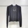Producto de dos piezas Producto Autumn Spring Instagram Traje plisado de viento Cadena de perla de moda simple, falda casual