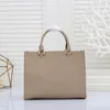 Sac à main de créateur classique Fourre-tout préférés pour femmes Lettres spacieuses et pratiques Empreinte shopper en déplacement Filles Grande capacité Sacs de travail pour ordinateur portable à la mode Sac à bandoulière