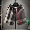 Herrkvinnor Designers Shorts Summer Fashion Streetwears kläder Snabbtorkning Badkläder Printing Board Beach Pants M 5XL 220621