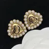 Kobiety projektanci perła kolczyk luksusowa biżuteria miłość kształt Ear Stud moda damska marka projektant Hoops szpilki złote kolczyki koła 2022