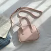 Petite femme sac de créateur tendance sacs à bandoulière ronde dame sacs à main de luxe mini femmes mode