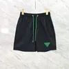 Roupa de banho masculina moda nova marca triângulo verde padrão swimtrunk casual cinco minutos calças de praia shorts masculino verão fino spo290n