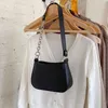 2022 Novo Estilo Ins Friger Fred Black Splicing Bag Magia Stick Saco Europeu e American Street Pu uma bolsa de ombro Moda feminina
