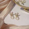 Dangle żyrandol z Korei Południowej biżuteria modowa słodka i elegancka łuk miedziana cyrkon perłowa woda upuszcza żeńska