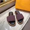 Diseñador Piscina Almohada Confort Sandalias Zapatillas Mula Desfile de moda Nueva zapatilla Dama Zapatos de nylon Correa Hombres Sandalias de cuero Puesta de sol Plana Suela de goma Diapositivas